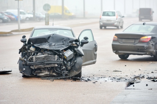 Two cars after getting into wreck with each other